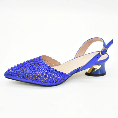 Matching elegant handbag set alongside Luxury Italian Rhinestone women’s pumps from Hot Trends Area, crafted with exquisite materials for special events.