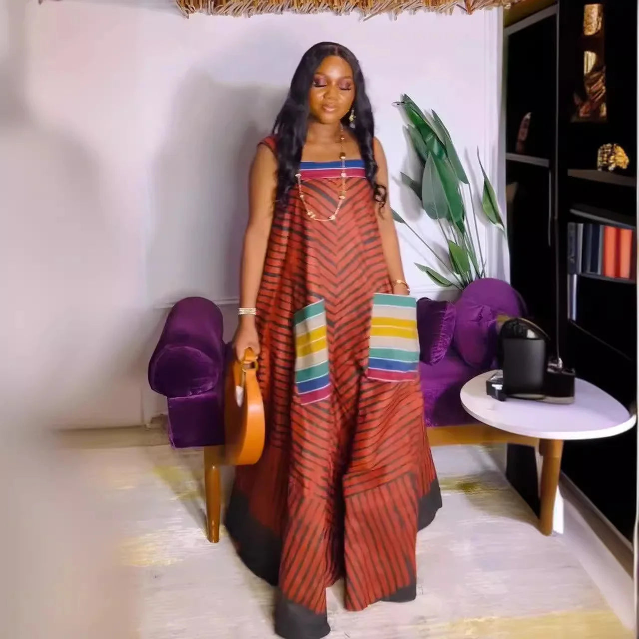 Stylish CM.YAYA Women’s Striped Jumpsuit with a loose fit and sophisticated design, perfect for women seeking luxury in their summer wardrobe.