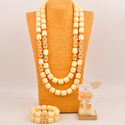 Elegant Nigerian bridal jewelry set featuring artificial coral beads, including a stunning necklace with intricate detailing, perfect for weddings.