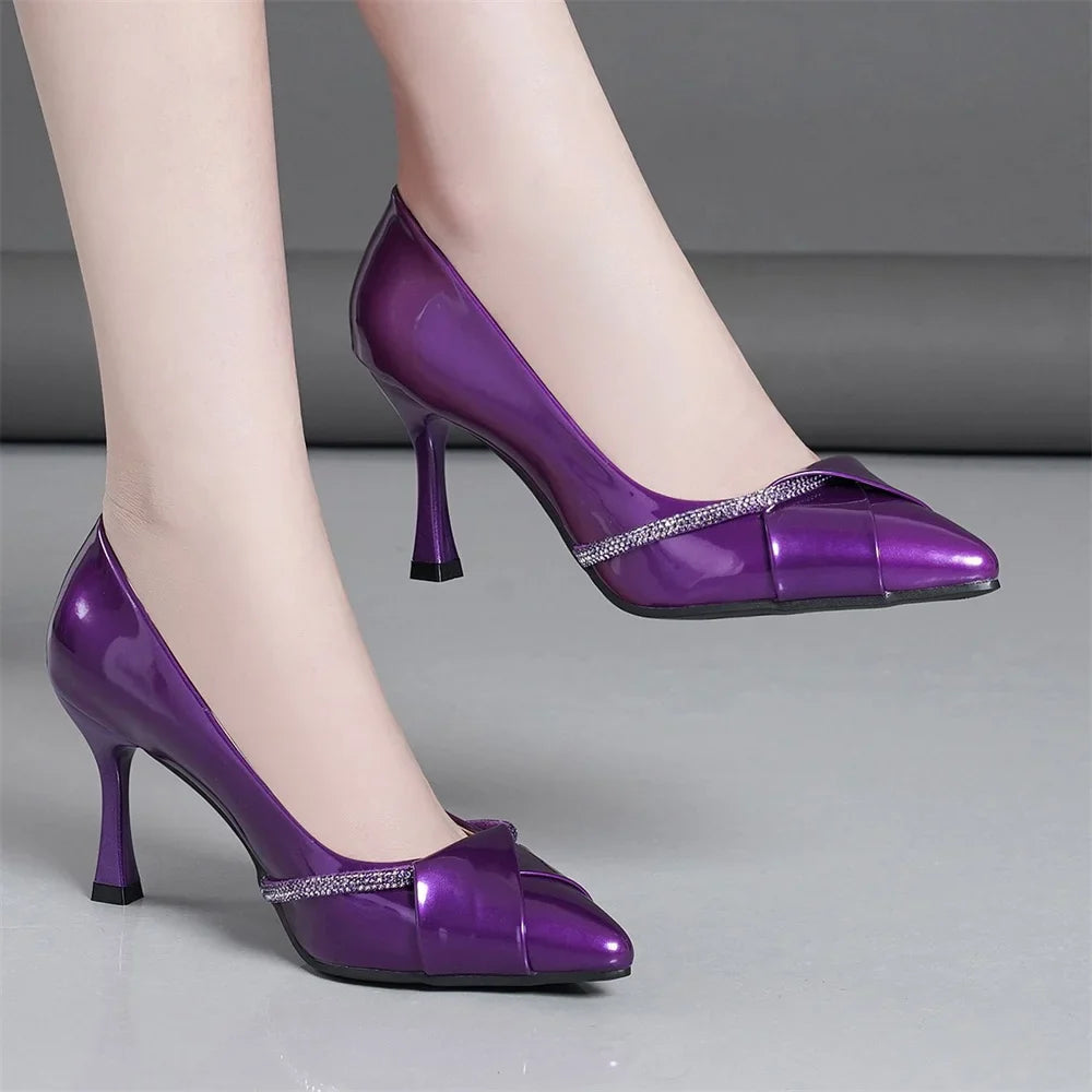 Elegant purple pointed toe stiletto heels adorned with rhinestone strap, perfect for women's casual wedding attire and special occasions.