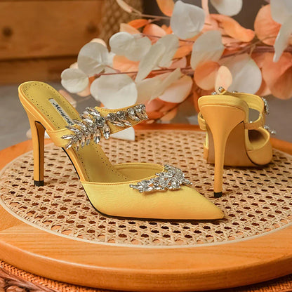 Close-up view of stunning silk rhinestone pointed stiletto mules sandals, showcasing luxurious craftsmanship and summer-ready style for fashionable women.