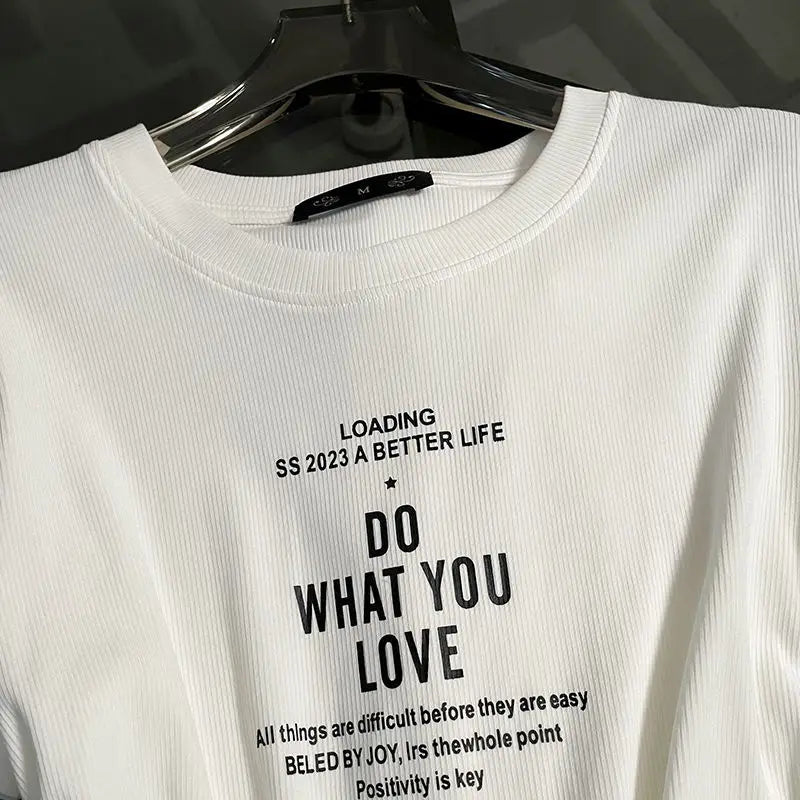 Close-up view of a stylish women's pullover top from the summer two-piece set, showcasing quality synthetic fabric in a chic design.