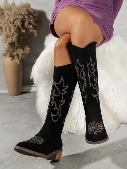 Elegant knee-high Chelsea cowboy boots for women in a sleek punk style, featuring mid heels and a stylish zipper closure, perfect for adding a hint of luxury to any outfit.
