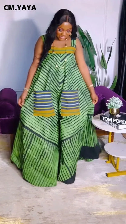 Fashion-forward CM.YAYA Sleeveless Jumpsuit styled with statement heels, epitomising luxury summer attire with its modern striped pattern and high waist fit.