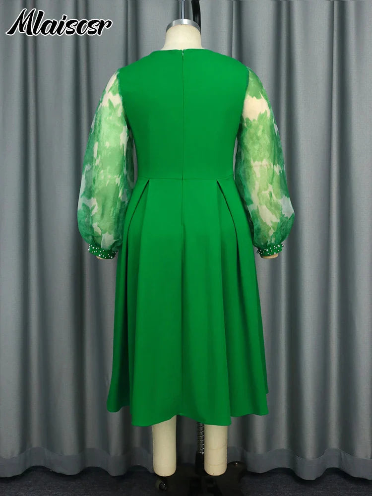 Glamorous green office dress with an elegant O-neck and full sleeves, designed by Mlaiscsr for stylish women, exuding sophistication and professionalism.