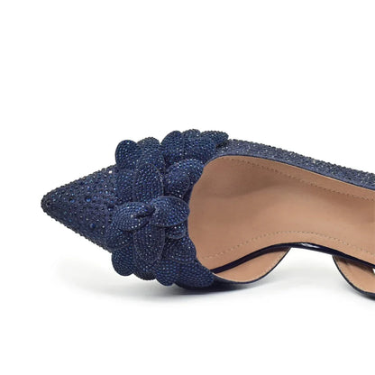 Luxury women's Italian high heel pumps in gold with full diamond embellishments, part of an elegant shoe and bag set.