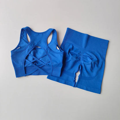 Complete High Waist Hip Lifting Women's Fitness Set displayed elegantly, including a bra, yoga dress, and shorts, emphasising sophistication and style.