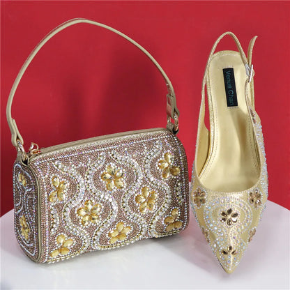 Fuchsia high heels and matching bag set with luxurious rhinestone toe detail, designed for women, showcasing elegance and comfort.