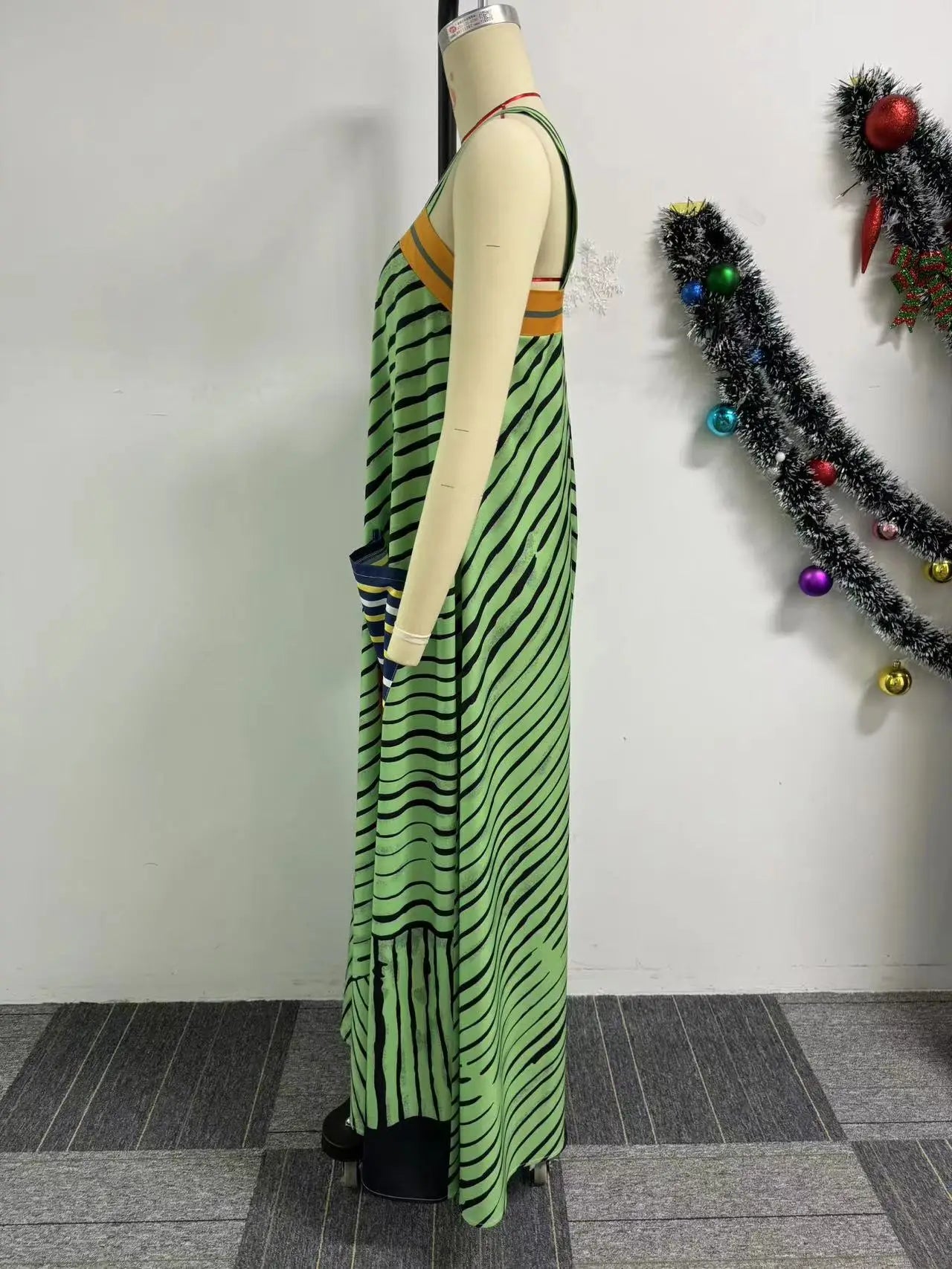 Sophisticated CM.YAYA Women’s Striped Jumpsuit featuring wide leg pants and practical pockets, perfect for both casual and formal summer events.