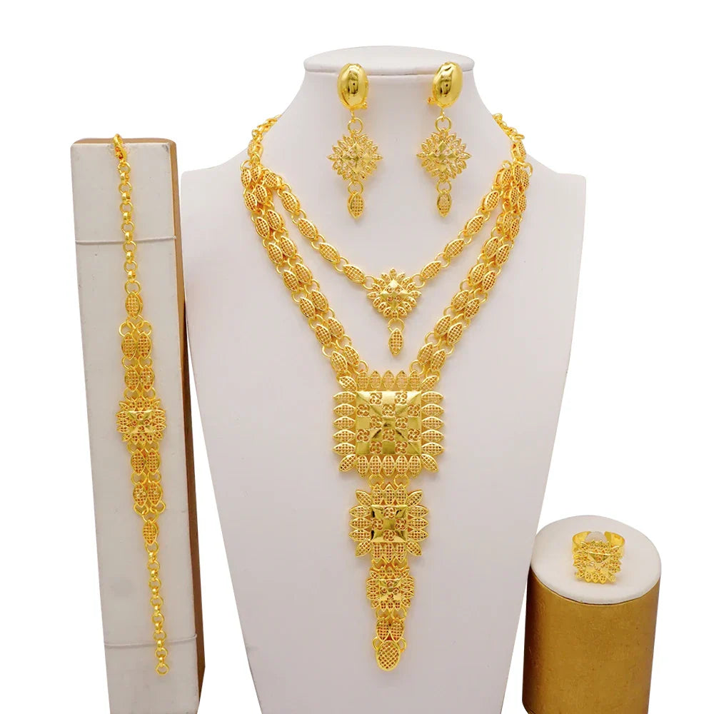 Luxury Dubai gold colour jewelry set for women featuring an elegant bridal necklace, earrings, bracelet, and ring with intricate African design.