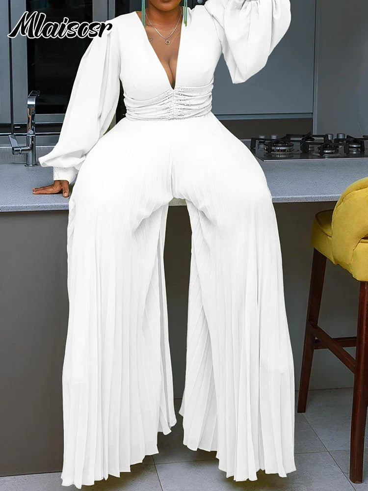 Stylish high-waisted jumpsuit highlighted by its wide leg design and elegant loose fit, perfect for evening parties, embodying sophistication and luxury by Mlaiscsr.