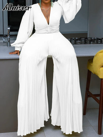 Stylish high-waisted jumpsuit highlighted by its wide leg design and elegant loose fit, perfect for evening parties, embodying sophistication and luxury by Mlaiscsr.