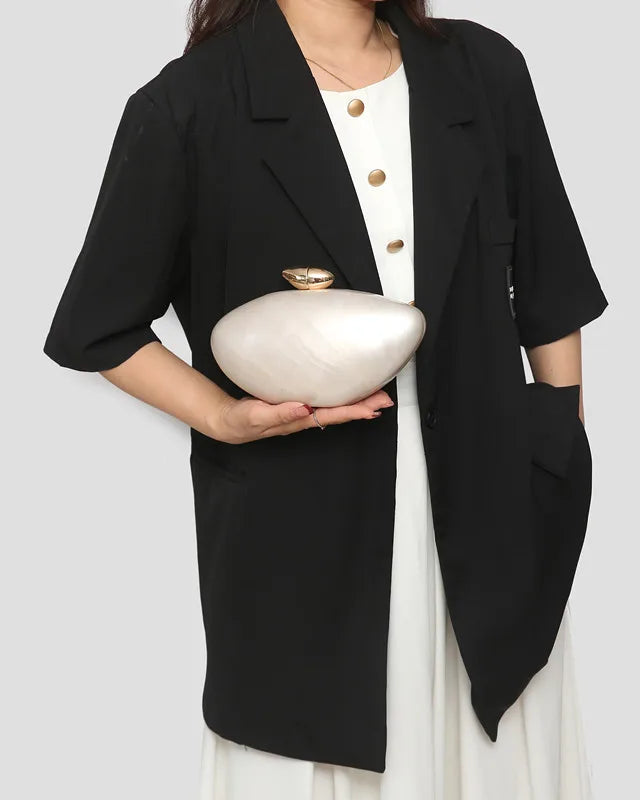 Sophisticated evening bag featuring a sleek ellipse silhouette, suitable for upscale gatherings.