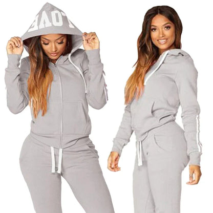 Luxurious women's hooded jogging tracksuit in cotton linen, featuring stylish stripes, perfect for spring and summer wear.