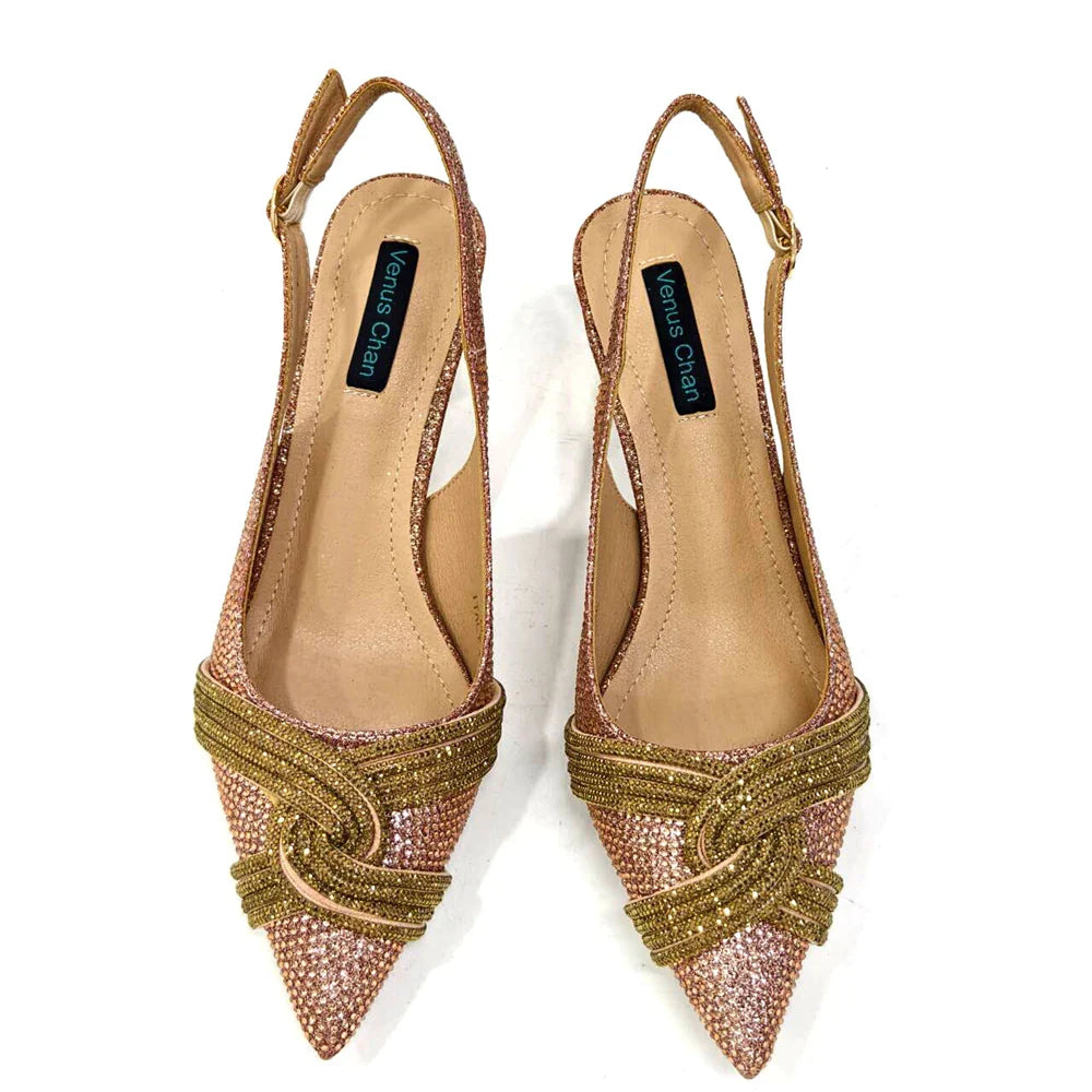 Luxurious orange African woman shoe and bag set with shimmering crystals, perfect for weddings and parties.