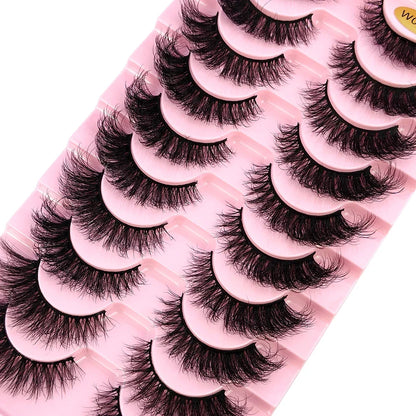 Close-up view of luxurious false eyelashes, featuring soft, wispy strands for a natural yet glamorous appearance.