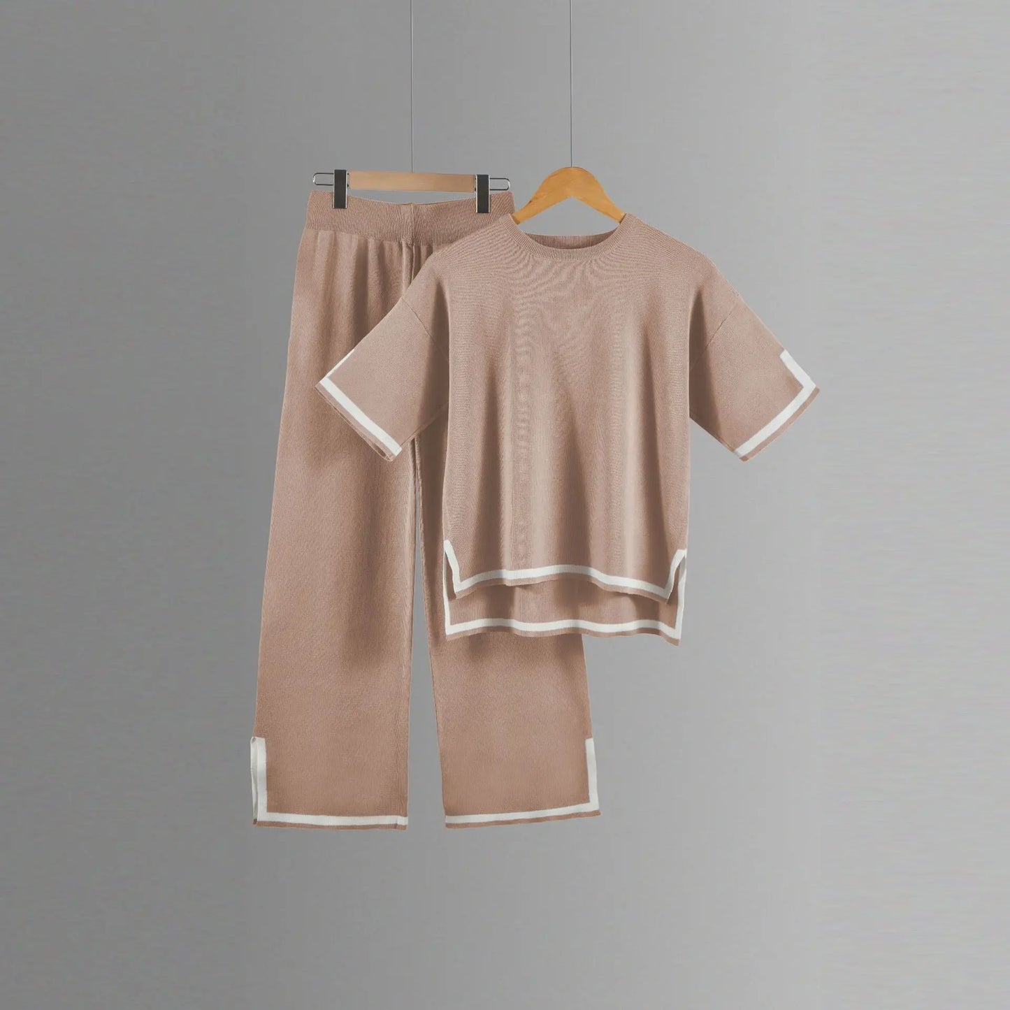 Beautifully styled two-piece knitted trousers suit for women, featuring ankle-length pants and a modern O-neck pullover, suitable for middle-age fashion lovers.