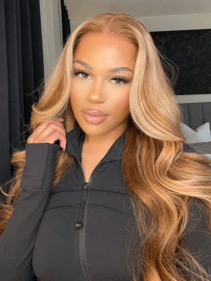Close-up of the light brown lace color on the honey blonde body wave wig, emphasizing the seamless blend with natural skin tones.