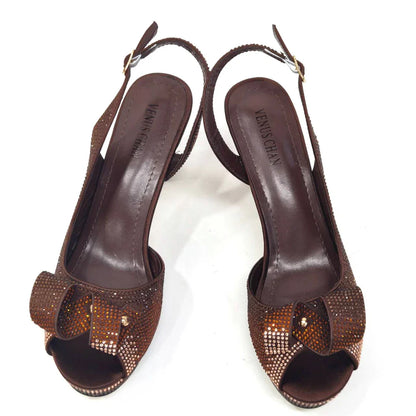 Sophisticated combination of Venus Chan peach slingback high heels and matching bag, tailored for women's fashion-forward party wear with haute couture appeal.