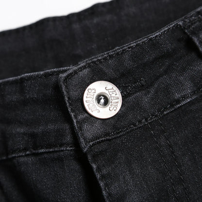 Luxury men's ripped skinny jeans designed in vintage stonewashed denim, epitomising casual elegance with a slim fit style.