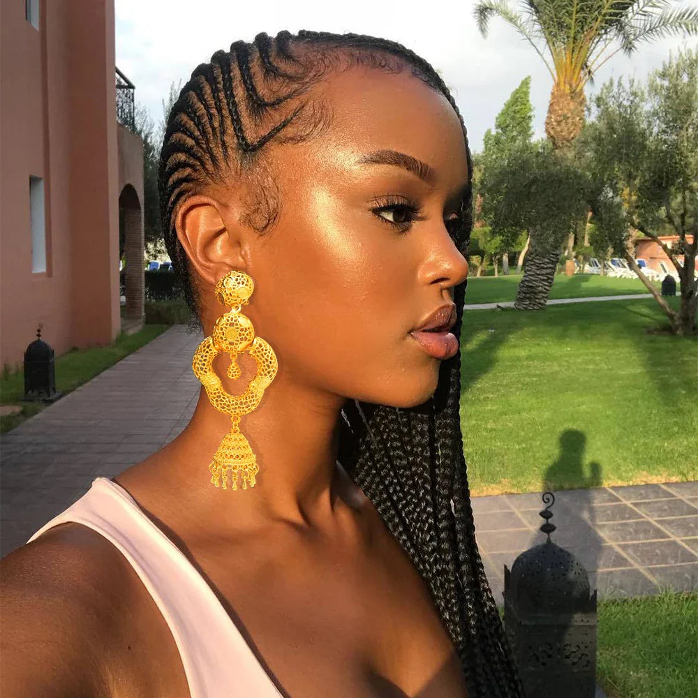 Model wearing Trendy Bohemia Long Tassel Earrings, embodying sophisticated bohemian elegance perfect for weddings and special occasions.