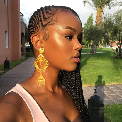 Model wearing Trendy Bohemia Long Tassel Earrings, embodying sophisticated bohemian elegance perfect for weddings and special occasions.