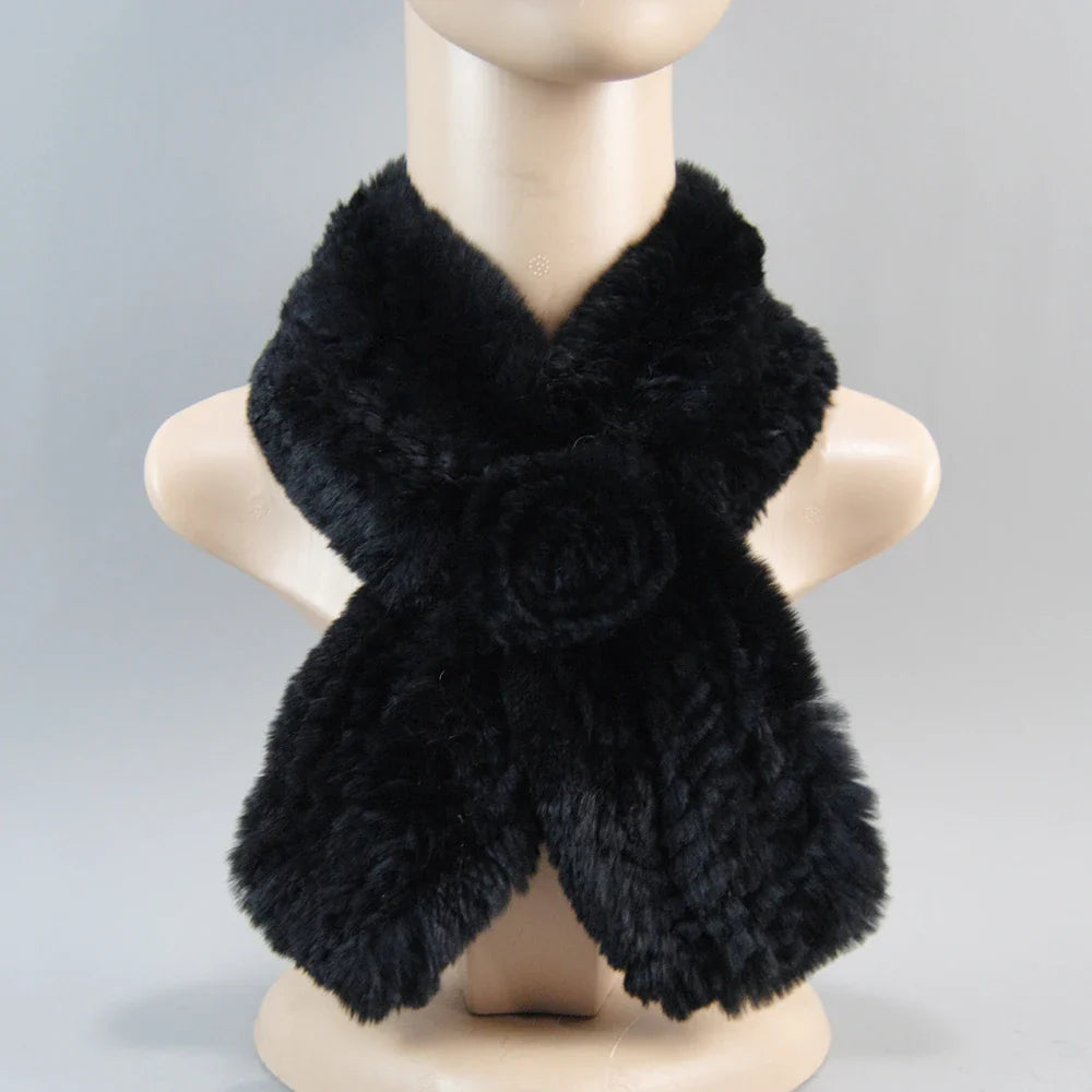 Elegant women's faux fur hat and scarf set displayed together, embodying luxury and warmth for winter outings and stylish appearances.