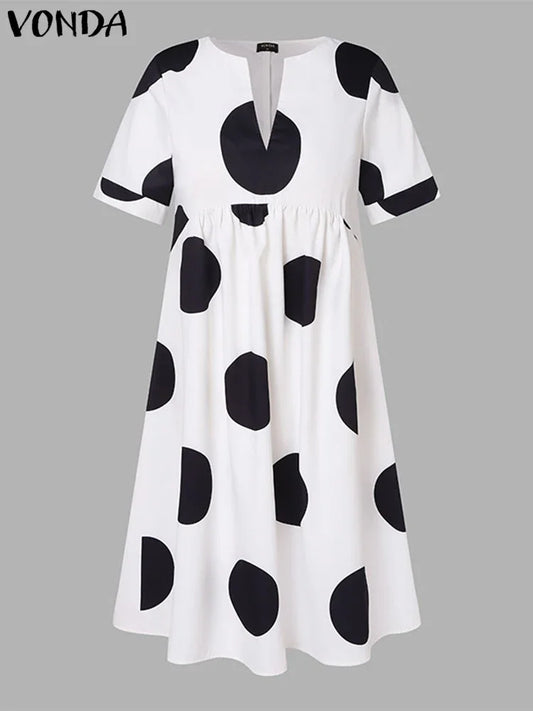 Stylish VONDA Plus Size 5XL Bohemian Maxi Dress, adorned with classic polka dots, ideal for beach, party, or holiday wear.