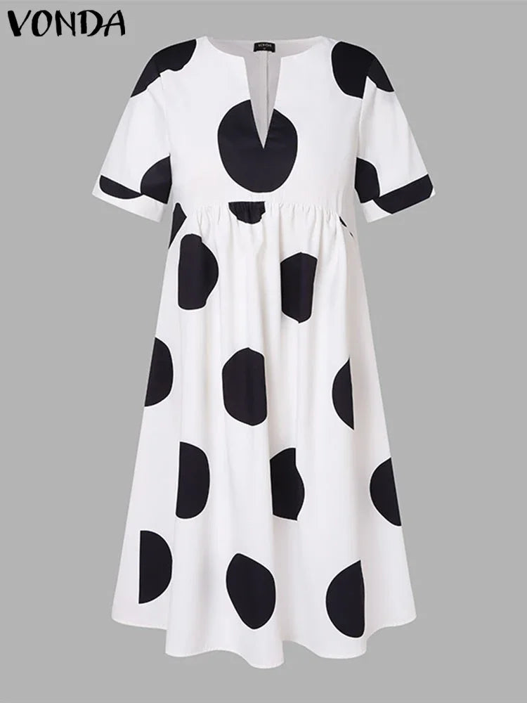 Stylish VONDA Plus Size 5XL Bohemian Maxi Dress, adorned with classic polka dots, ideal for beach, party, or holiday wear.