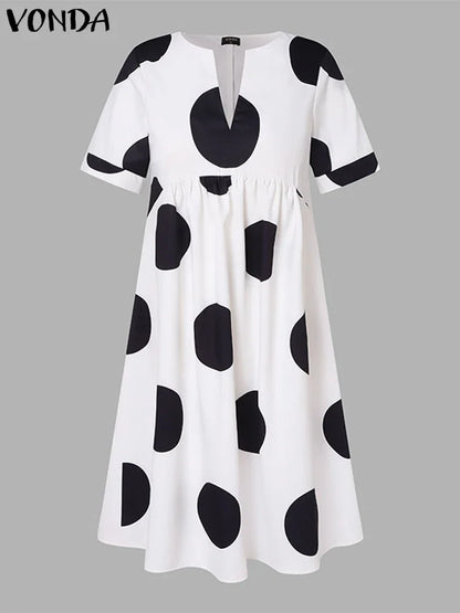 Stylish VONDA Plus Size 5XL Bohemian Maxi Dress, adorned with classic polka dots, ideal for beach, party, or holiday wear.