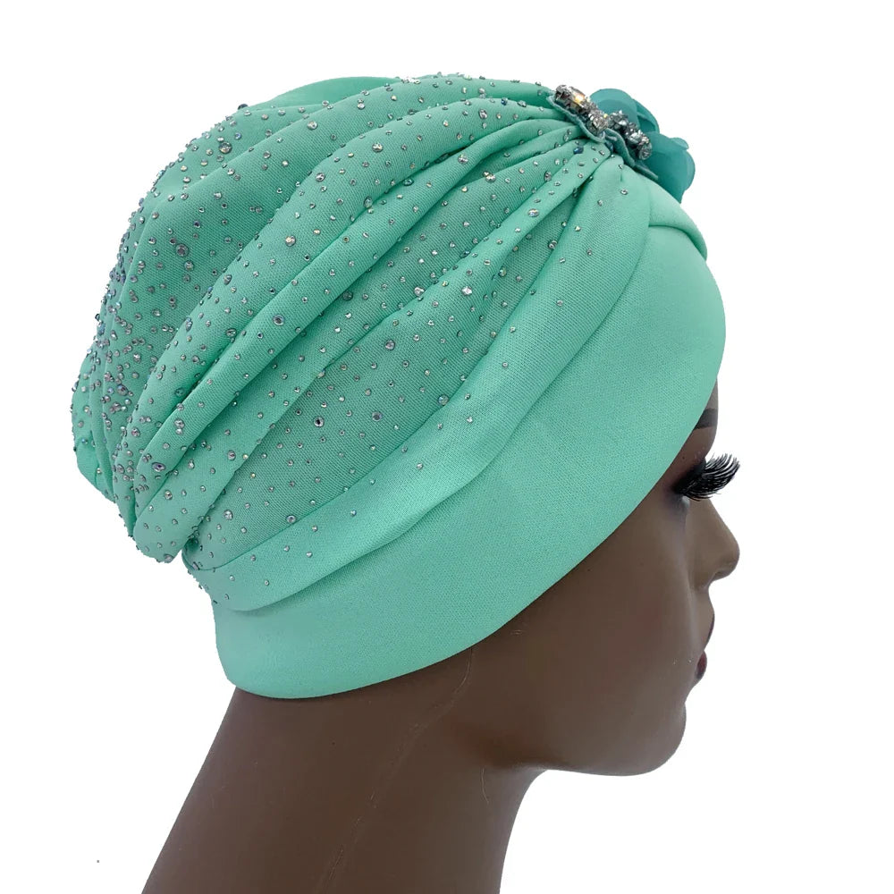 Elegant African turban cap in rich fabric with dazzling rhinestone accents, designed for women with head circumference of 56-58cm, perfect for a stylish look.