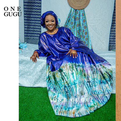 Detailed view of the Premium Nigerian Bazin Riche Dashiki Gown, highlighting the exquisite embroidery lace and rich cotton fabric, tailored for women.