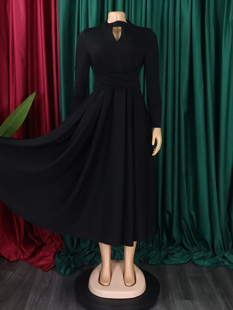 Stylish regular sleeve and slim fit of the Wmstar Plus Size women’s African dress, showcasing a luxurious silhouette.