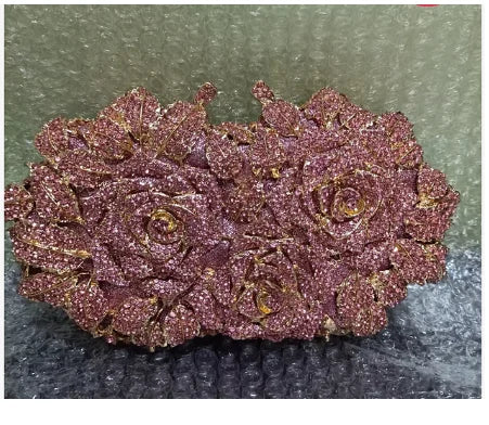 Stylish women's evening purse featuring a chic design with a premium metallic finish, ideal for upscale events.