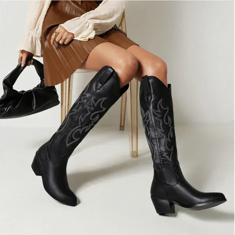 Stylish front view of luxury brown PU leather knee-high ankle boots for fashionable women.