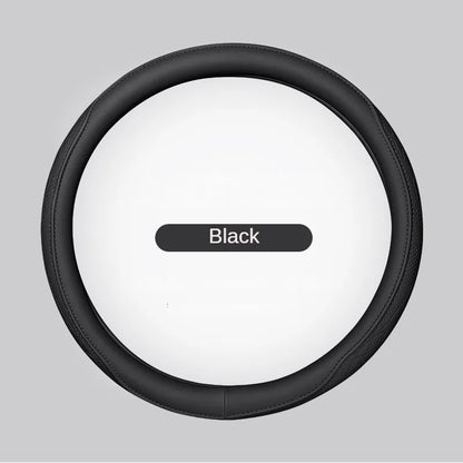 Luxurious Napa leather perforated steering wheel cover in an elegant patchwork design, providing comfort and breathability for a sophisticated driving experience.