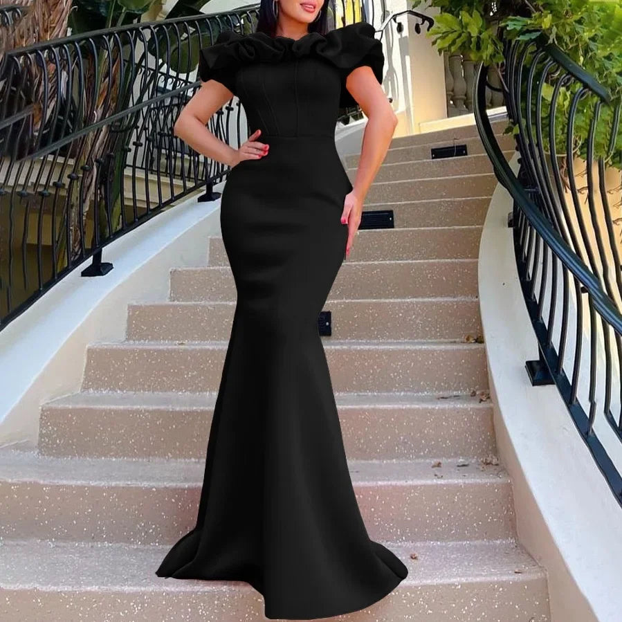 Full length image of a glamorous off shoulder mermaid dress in a sophisticated solid shade, ideal for evening wear and formal gatherings.