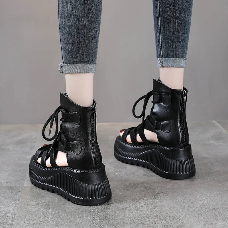 Sophisticated summer fashion shown through Koznoy's 8cm wedge ankle booties for women, designed with breathable materials and a chic rounded toe.
