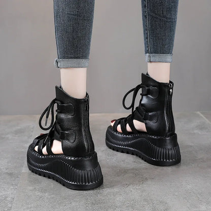 Sophisticated summer fashion shown through Koznoy's 8cm wedge ankle booties for women, designed with breathable materials and a chic rounded toe.
