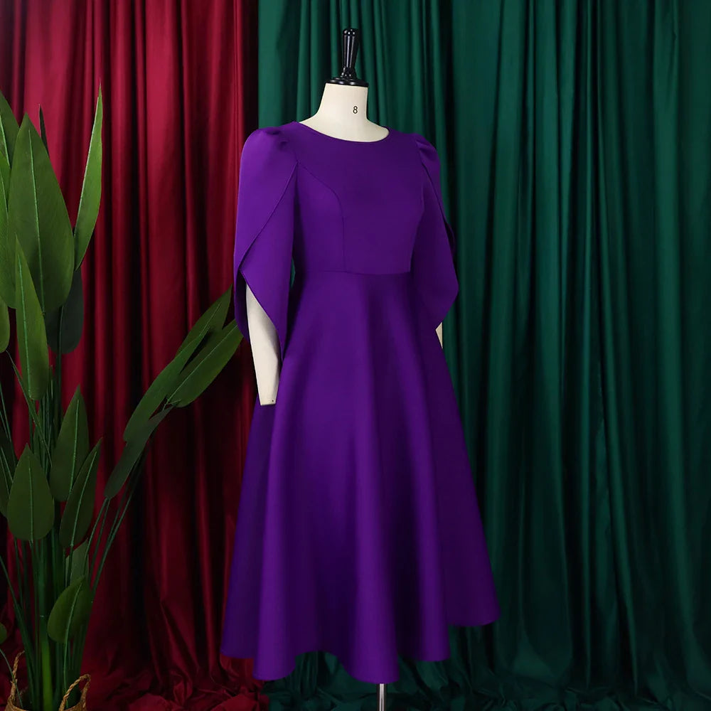 Close-up of the luxurious round neck and half sleeve design of the elegant mid-calf dress for women, emphasizing refined style and quality.