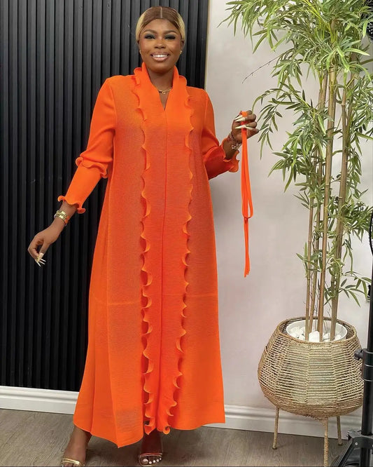 Elegant luxury women's loose casual abaya dress featuring stylish ruffle sleeves and a sophisticated ankle-length design, ideal for Eid celebrations.