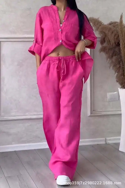 Elegant women's casual 2 piece set featuring a long sleeve pocket shirt beautifully paired with loose wide leg pants, ideal for Spring and Autumn fashion.