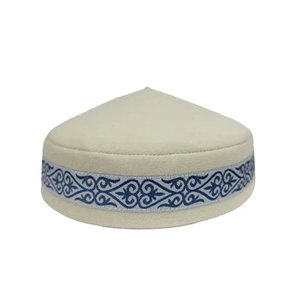 Elegant Kazakh handmade hat in blue, featuring exquisite embroidery, perfect for outdoor occasions and stylish winter wear.