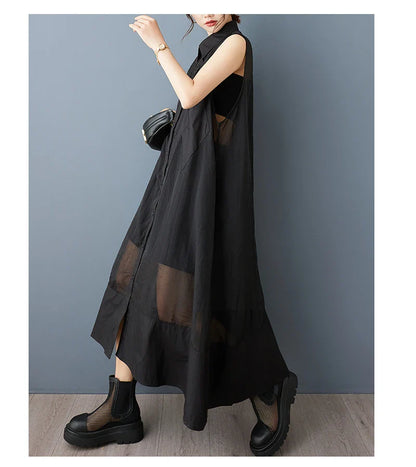 Back view of the NYFS Casual Shirt Dress, providing a glimpse of its sophisticated design and graceful draping that enhances a luxurious appeal.