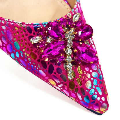 Close-up of the shimmering crystal detailing on yellow pointed toe pumps, perfect for evening elegance.