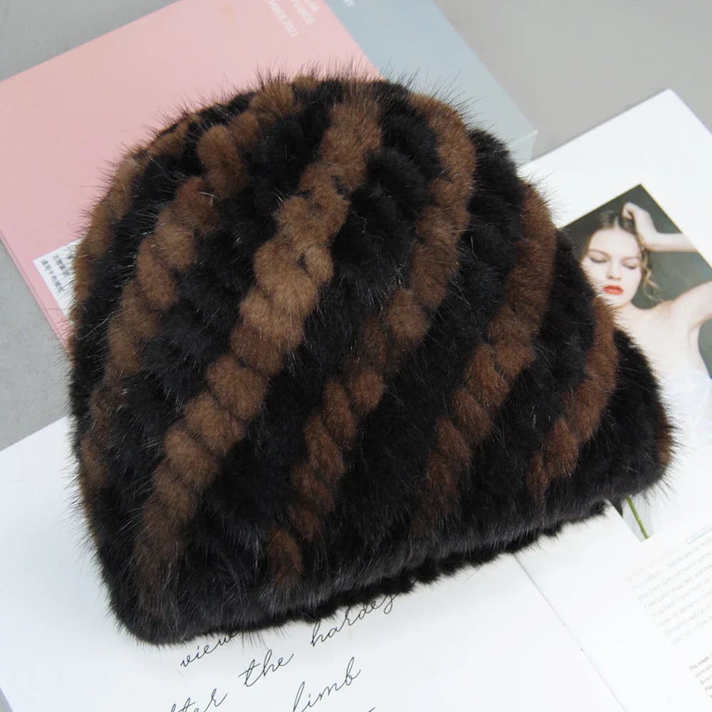Close-up view of the soft texture of the Women's Natural Mink Faux Fur Beanie, showcasing its luxurious fluffy design ideal for winter chic.
