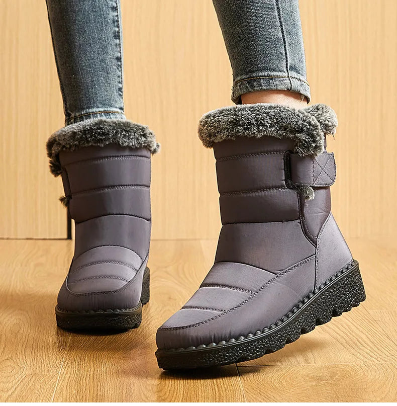 Chic women's winter boots with round toe and durable rubber outsole, ideal for snowy conditions and stylish everyday wear.