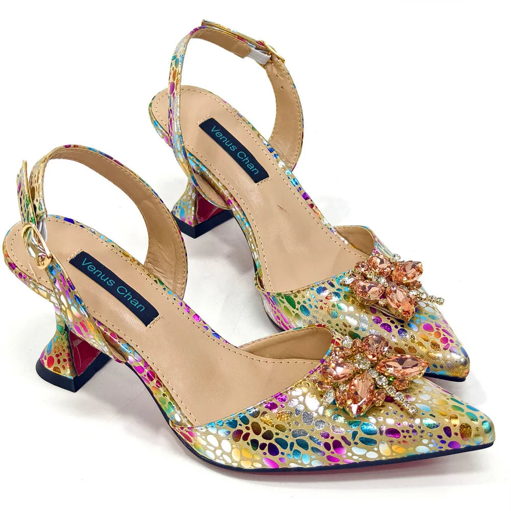 Chic matching handbag set with metal handle, elegantly crafted to complement yellow crystal pointed toe pumps for a luxurious women's ensemble.