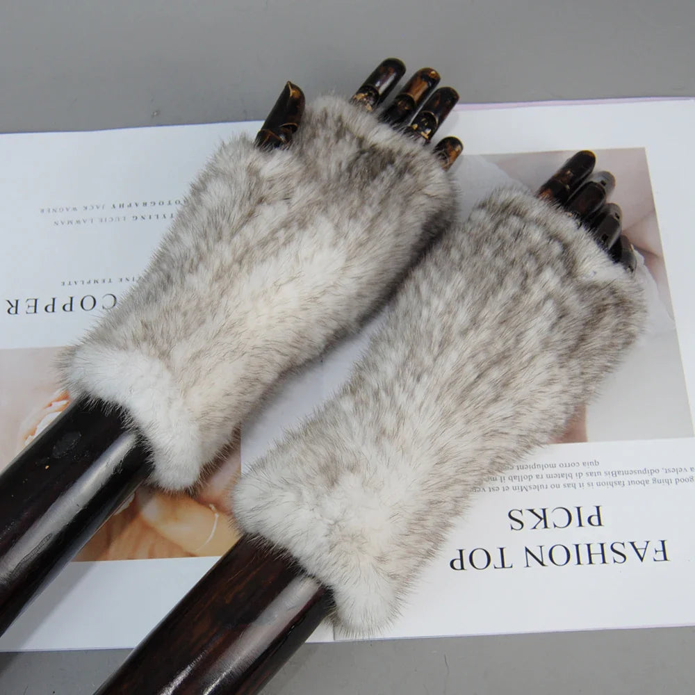 Soft and warm half finger gloves for women, crafted from 100% mink fur for a touch of luxury and practicality.