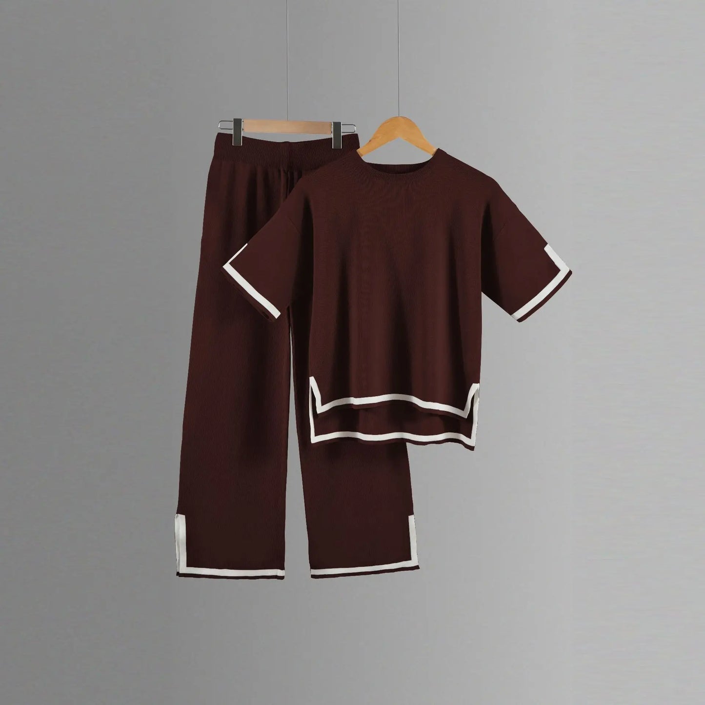 Luxurious polyester and cotton blend two-piece trousers suit for women, highlighting elegant design details suitable for mid-age fashion enthusiasts.